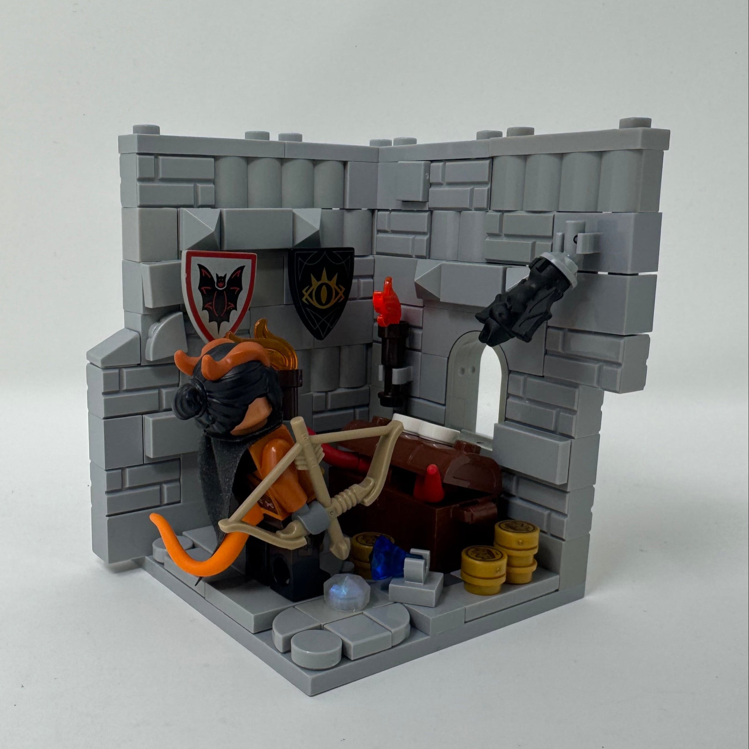 LEGO model of a castle interior with characters on a white background